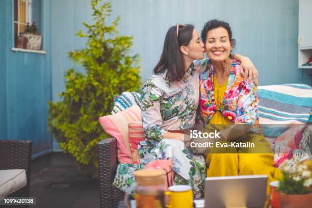 Mother And Daughter Are Embracing Each Other Stock Photo - Download Image Now - Mother's Day, Mother, Latin American and Hispanic Ethnicity