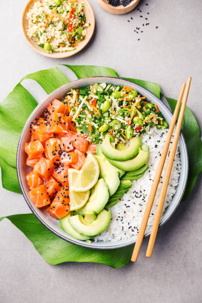 istock Poke bowl with salmon served in bowl 1091420764