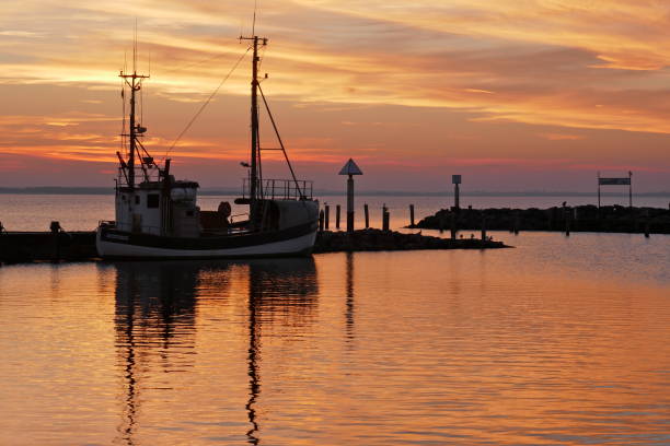 istock Sunset at a small harbor on the Baltic Sea in Germany 1091423746