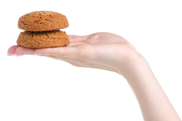 istock Oatmeal cookies in hand 1091425052