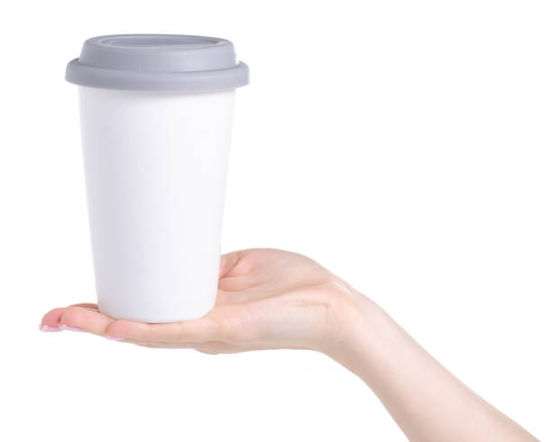 istock White cup mug with gray lid in hand 1091425088