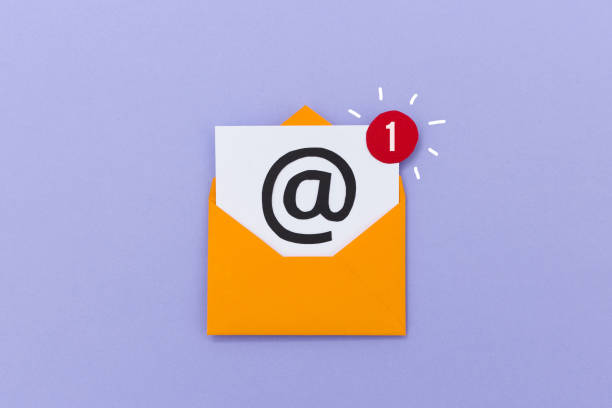 istock Colorful opened envelope with electronic mail letter showing one new message on purple background 1091429140