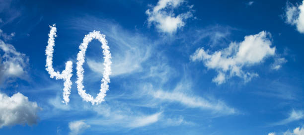istock Number 40 on a blue background with clouds 1091429968