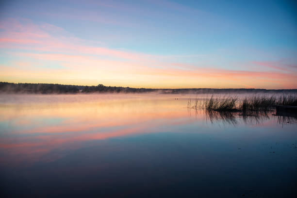 istock colorful misty sunset on the river in summer 1091430586