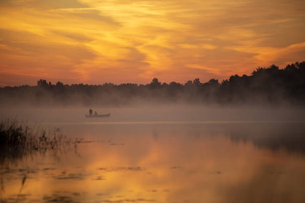 istock colorful misty sunset on the river in summer 1091432760