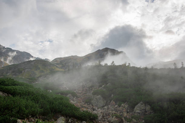 istock large misty cloud climbing mountain valley in slovakia, Tatra 1091432922