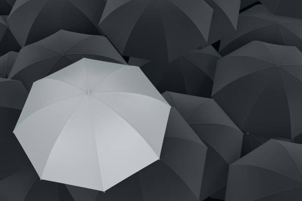 istock Umbrella Standing Out From The Crowd 1091434312