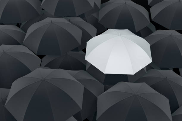 istock Umbrella Standing Out From The Crowd 1091435554