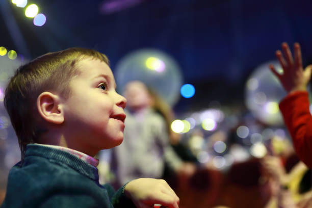 Smiling child in concert hall