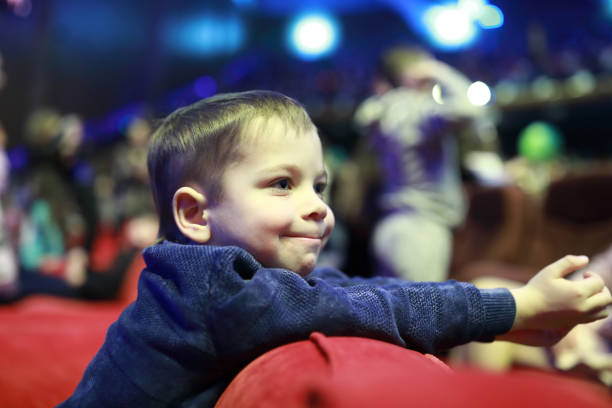 istock Smiling kid in concert hall 1091438108