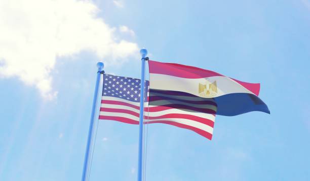 istock USA and Egypt, two flags waving against blue sky 1091438900