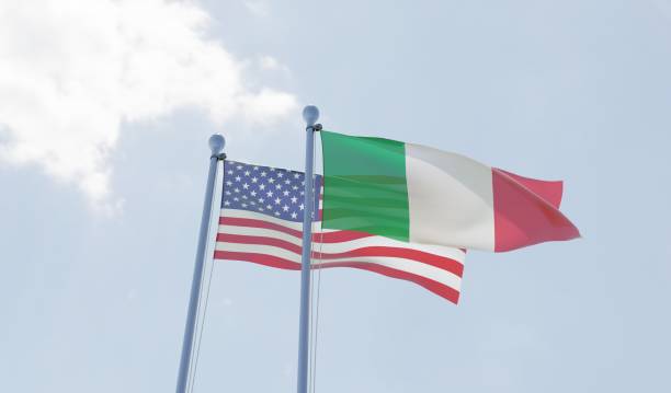 istock USA and Italy, two flags waving against blue sky 1091439026