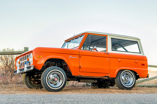 Fort Collins, CO, USA - January 7, 2019: Vintage, first generation,  Ford Bronco ranger wagon parked on a rural road. This legendary model was manufactured in 1972-1976.