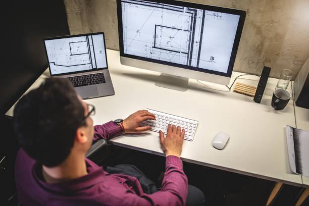 istock High angle view of an architect working from his wheelchair 1091441610