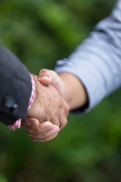 istock Business handshake outdoors 1091444132