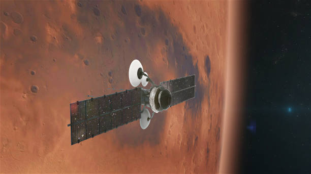 istock Space Research. Satellite orbiting near Mars 1091446252