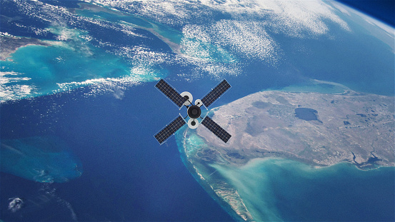 GPS or Weather Satellite orbiting Earth. CG image.