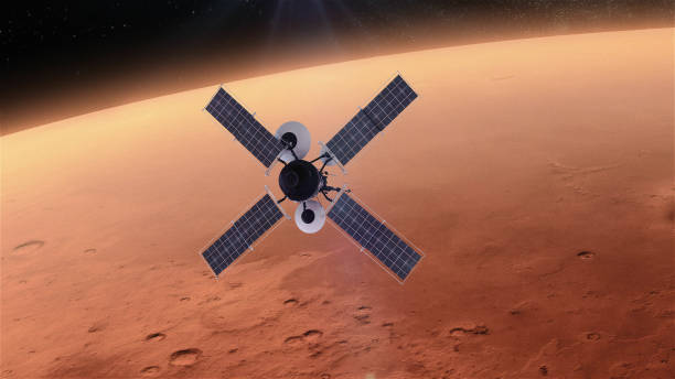 istock Space Research. Satellite orbiting near Mars 1091446364