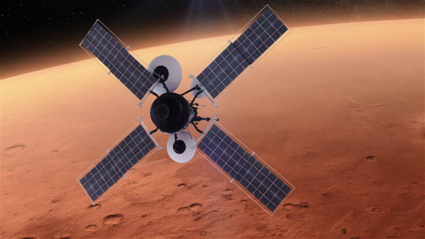 istock Space Research. Satellite orbiting near Mars 1091446368