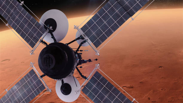 istock Space Research. Satellite orbiting near Mars 1091446388