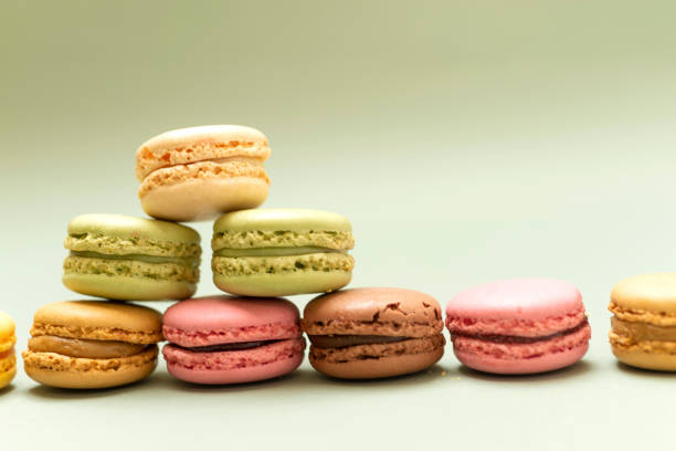 istock Front view of colorful macaroons on a marble background 1091449818