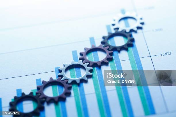 Gears On A Bar Chart Stock Photo - Download Image Now - Business Strategy, Gear - Mechanism, Investment