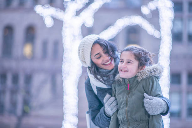 istock Mother And Daughter In Winter 1091459272