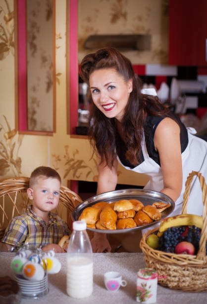 istock Mother and son in the kitchen with pastries. 1091462440
