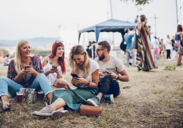 istock Using phones on a music festival 1091465132