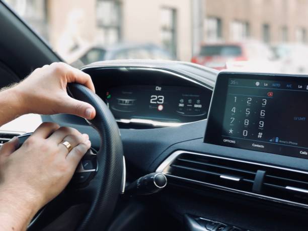 istock Man's hands on the steering wheel 1091465808