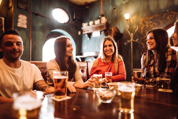 istock people talking indoors in a pub with the beers 1091467024