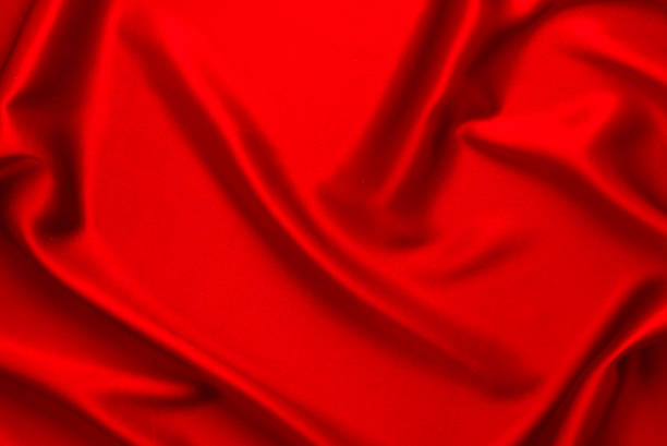istock Red silk or satin luxury fabric texture can use as abstract background. Top view 1091469164
