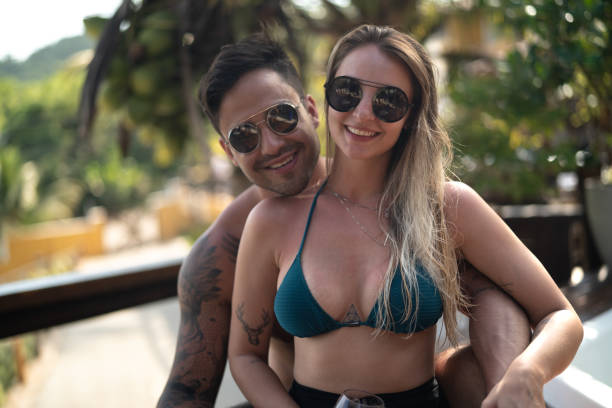 istock Couple Enjoying a Beach Holiday 1091470218