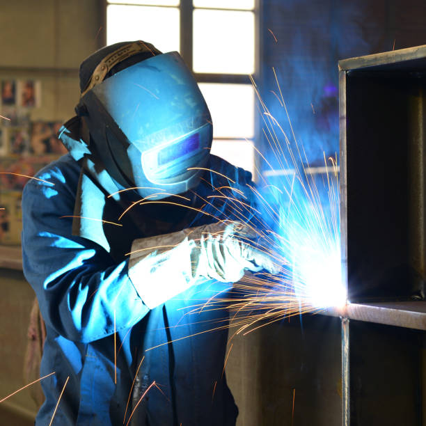 istock welder in work clothes working on a workpiece in an industrial company 1091470234