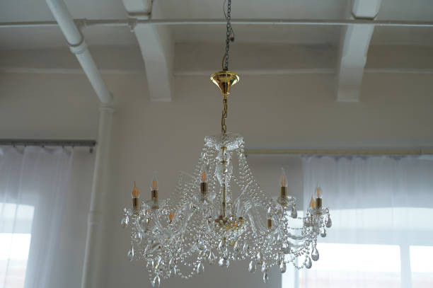 istock Several crystal chandeliers under the ceiling.Luxury and brilliance 1091472584