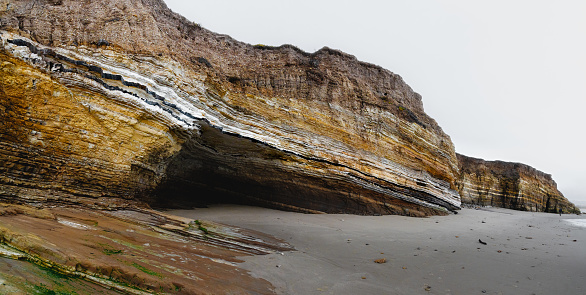 Cliff, limestone formation on the beach, moody landscape, California Coastline