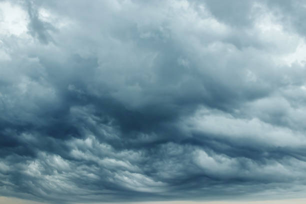 istock Storm clouds with contrast between dark gray and white that threaten a heavy rain. copy space 1091474188