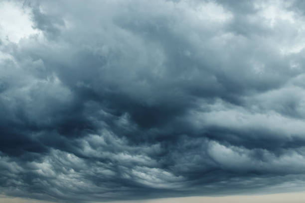 istock Storm clouds with contrast between dark gray and white that threaten a heavy rain. copy space 1091474204