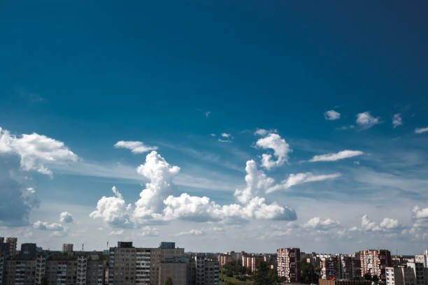 istock Fantastic, fluffy, white clouds against a blue sky. Rain clouds. The situation in the sky before the storm. copy space 1091474268