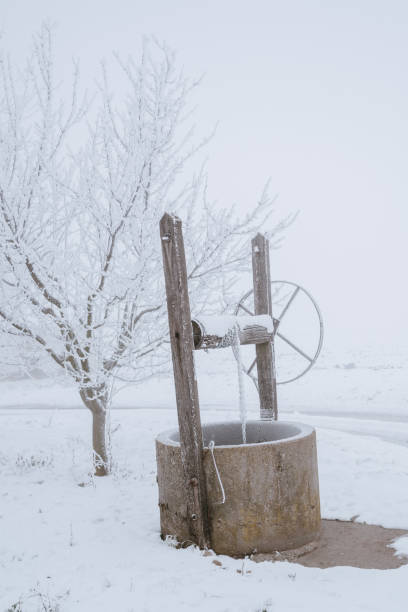 Well on the winter field Well on the winter field thomas wells stock pictures, royalty-free photos & images