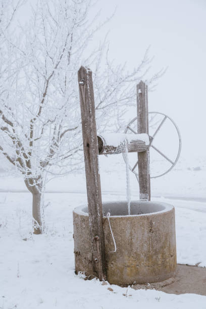 Well on the winter field Well on the winter field thomas wells stock pictures, royalty-free photos & images