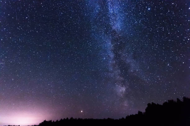 istock Starry sky, milky way, beautiful landscape, night time, Belarus. 1091475518