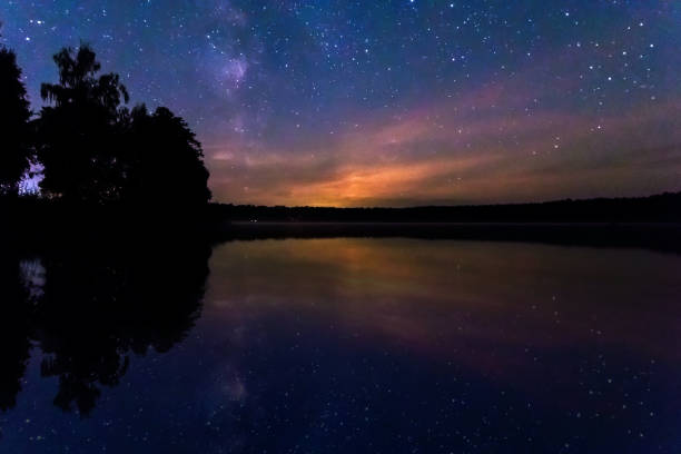 istock Starry sky, milky way, beautiful landscape, night time, Belarus. 1091475572
