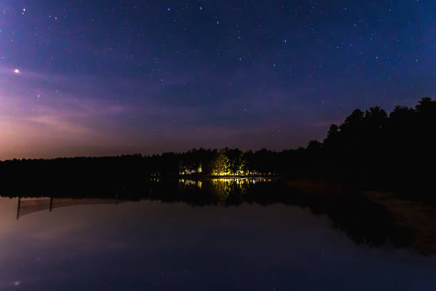 istock Starry sky, milky way, beautiful landscape, night time, Belarus. 1091475590