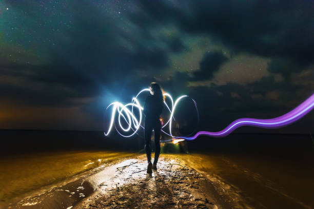 istock A lighting bolt striking from bright clouds in the night. Belarus. The starry sky. 1091475598