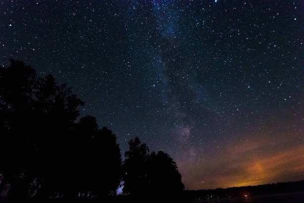 istock Starry sky, milky way, beautiful landscape, night time, Belarus. 1091475600