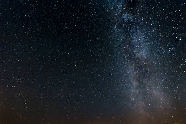 istock Starry sky, milky way, beautiful landscape, night time, Belarus. 1091475662