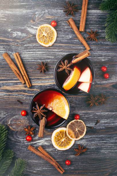 istock Christmas mulled wine on rustic table top view. Traditional drink on winter holiday. 1091480628