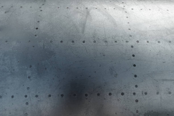 istock Texture, Aluminum fuselage and rivets on an old plane. Old technologies. copy space 1091485298