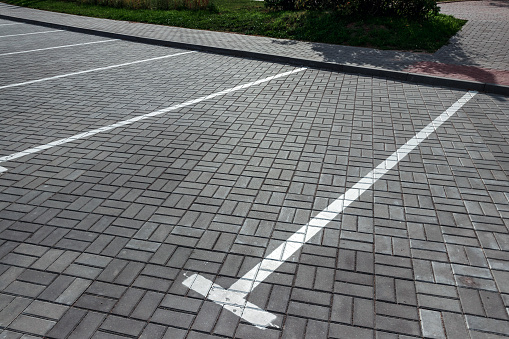 Parking, marking on the asphalt parking spaces. The concept of a lack of parking in megacities, paid parking